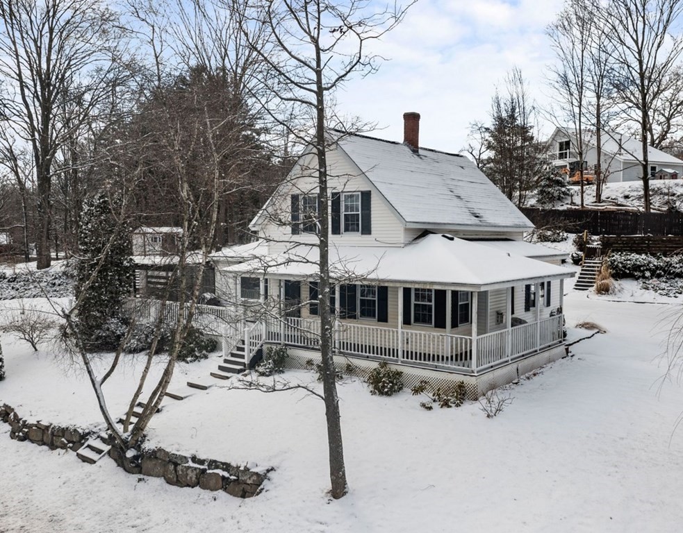 3 Upton Road Westborough, MA 01581 - Photo 4 of 34 a view of a house with yard and sitting area