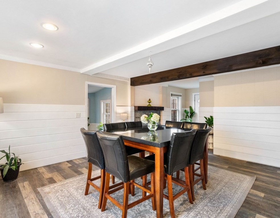 3 Upton Road Westborough, MA 01581 - Photo 6 of 34 a view of a dining room with furniture and wooden floor