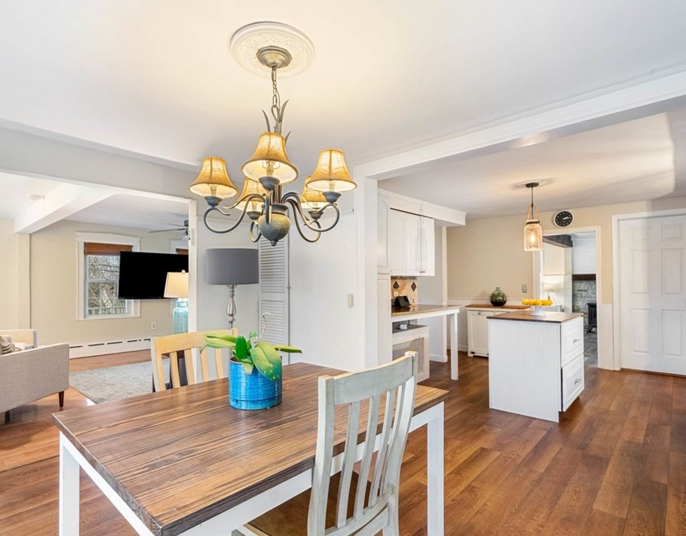 3 Upton Road Westborough, MA 01581 - Photo 10 of 34 a kitchen with a table and chairs in it