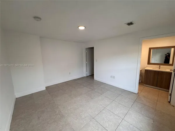 a view of a kitchen with a sink