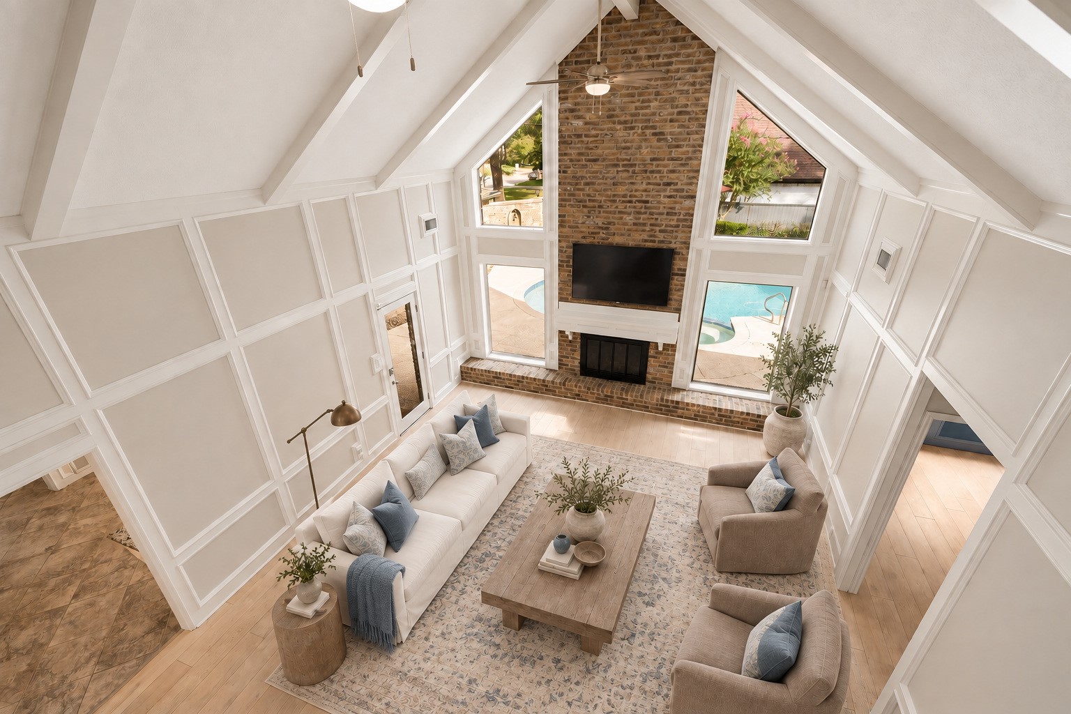 9203 Godstone Lane Spring, TX 77379 - Photo 20 of 38 The upstairs landing offers another beautiful view of the pool and floor-to-ceiling fireplace. Image has been virtually staged.