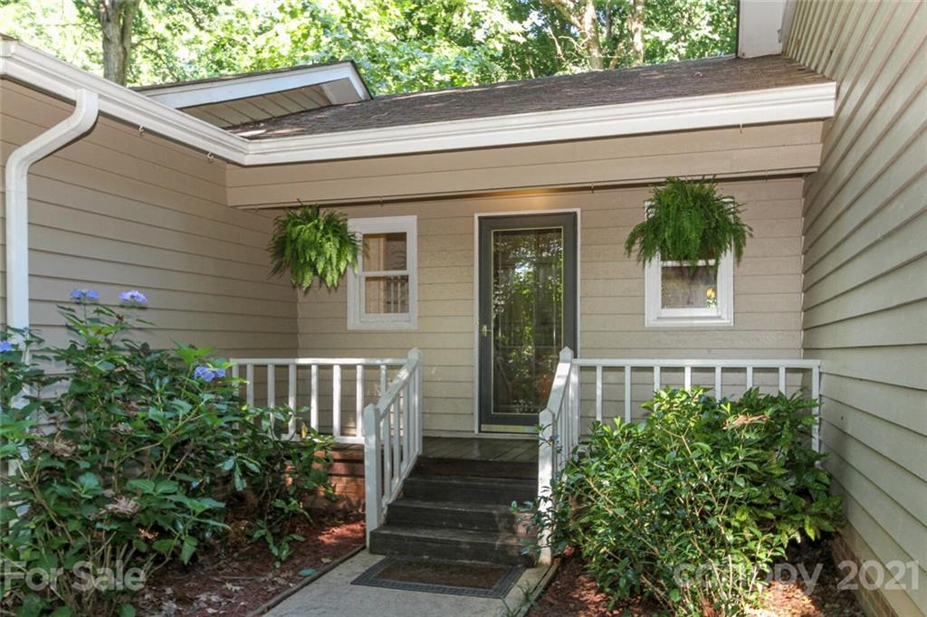 6204 Potter Road Matthews, NC 28104 - Photo 2 of 31 a view of a house with potted plants