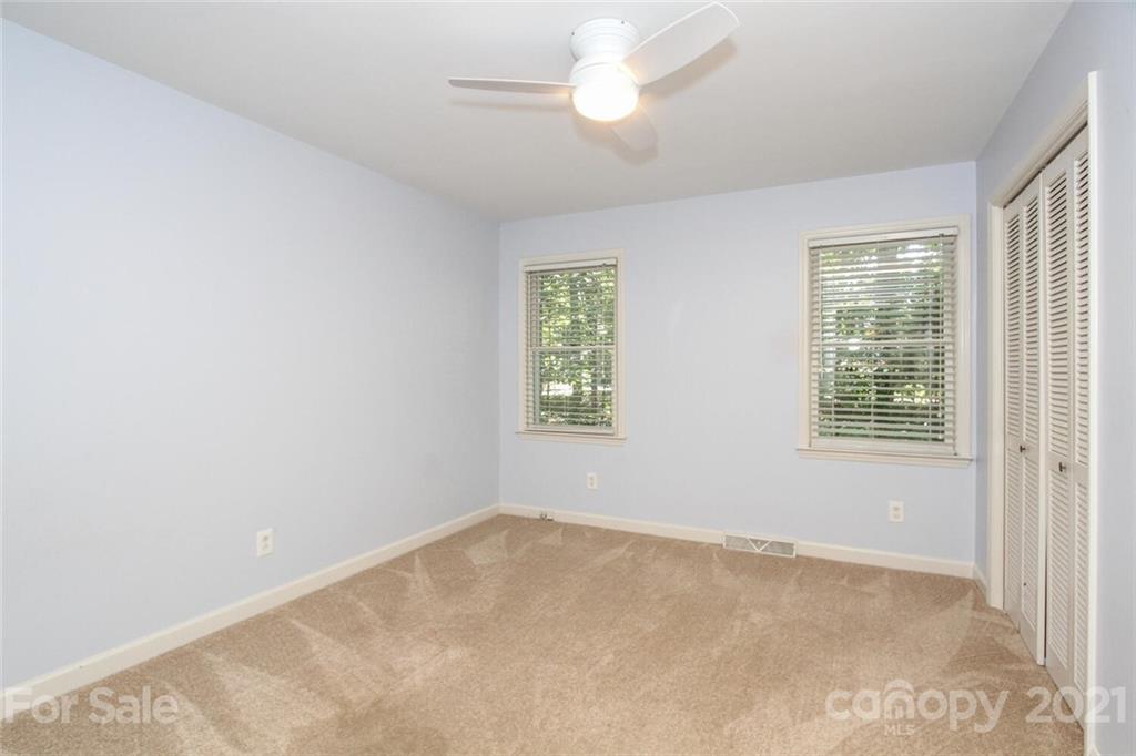 6204 Potter Road Matthews, NC 28104 - Photo 19 of 31 a view of an empty room with a window
