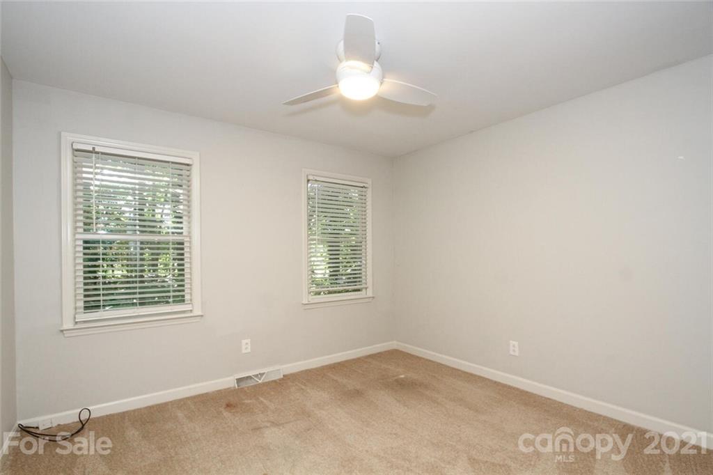6204 Potter Road Matthews, NC 28104 - Photo 21 of 31 an empty room with a window