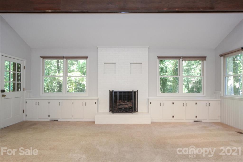6204 Potter Road Matthews, NC 28104 - Photo 6 of 31 an empty room with windows