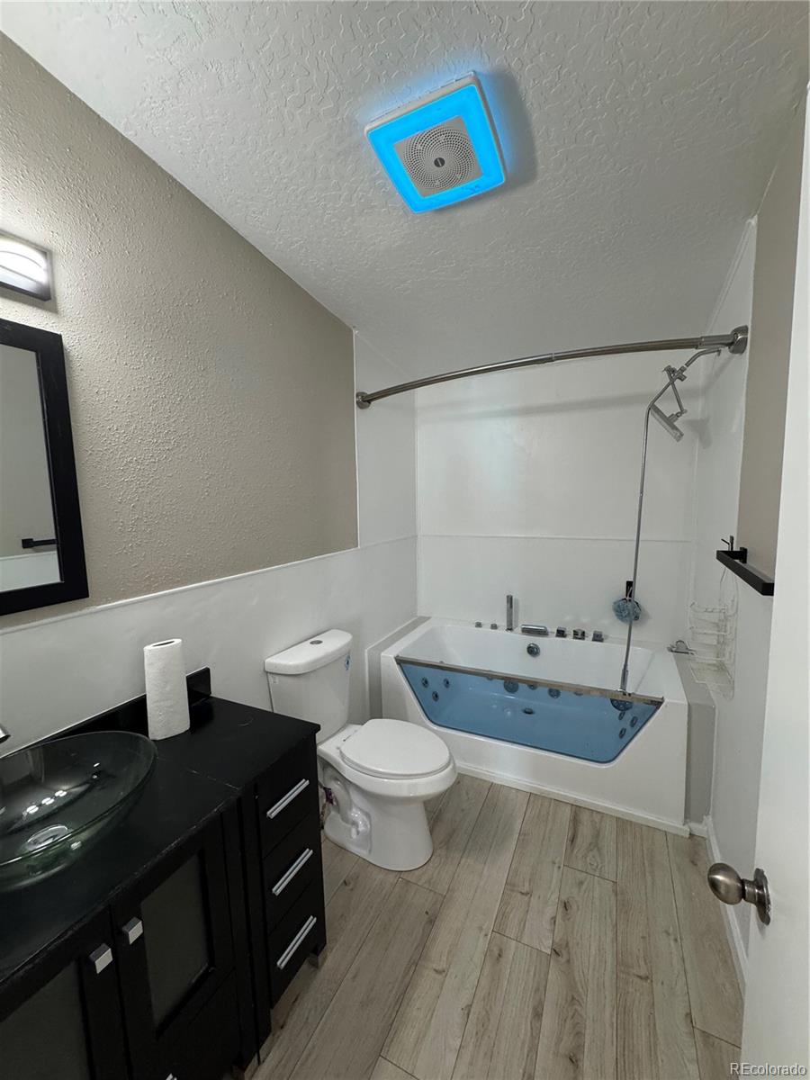 475 Pierce Street Erie, CO 80516 - Photo 10 of 16 a bathroom with a sink and a mirror