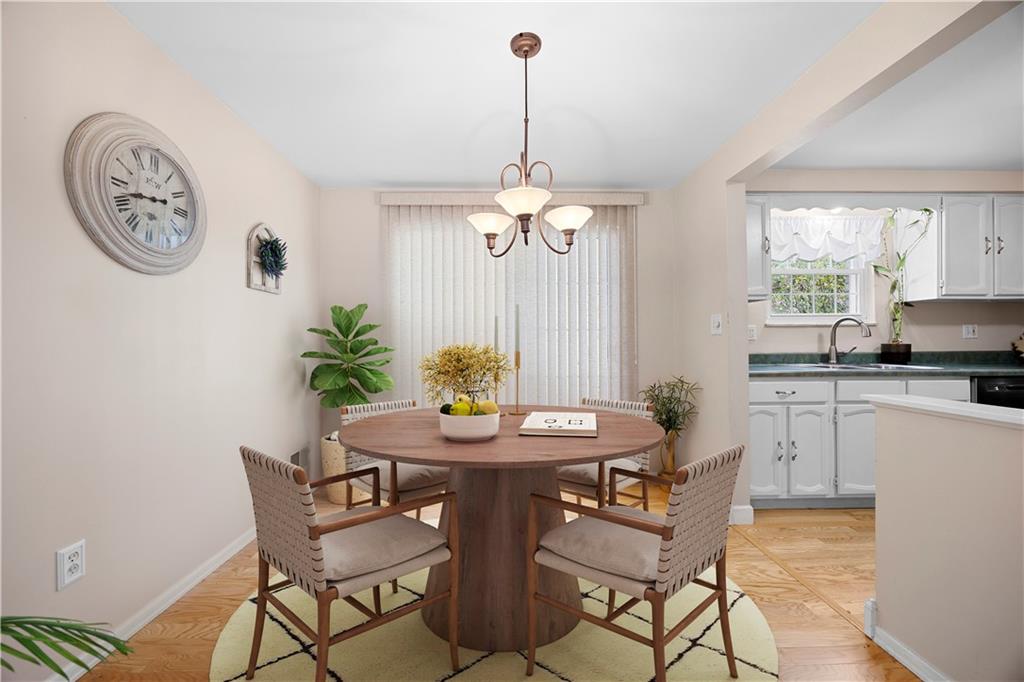 4036 Crabapple Drive McKees Rocks, PA 15136 - Photo 8 of 39 a dining room with furniture and window