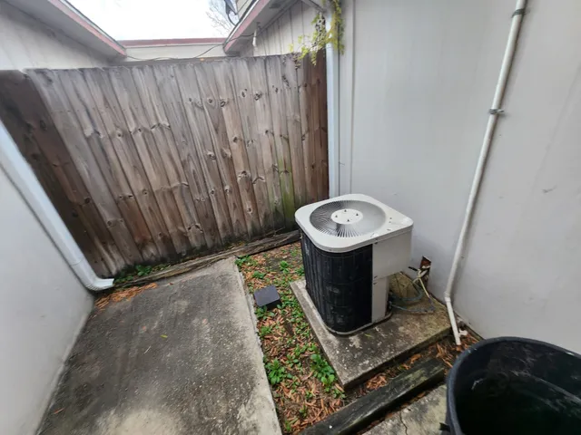 a view of a room with rack and wooden floor