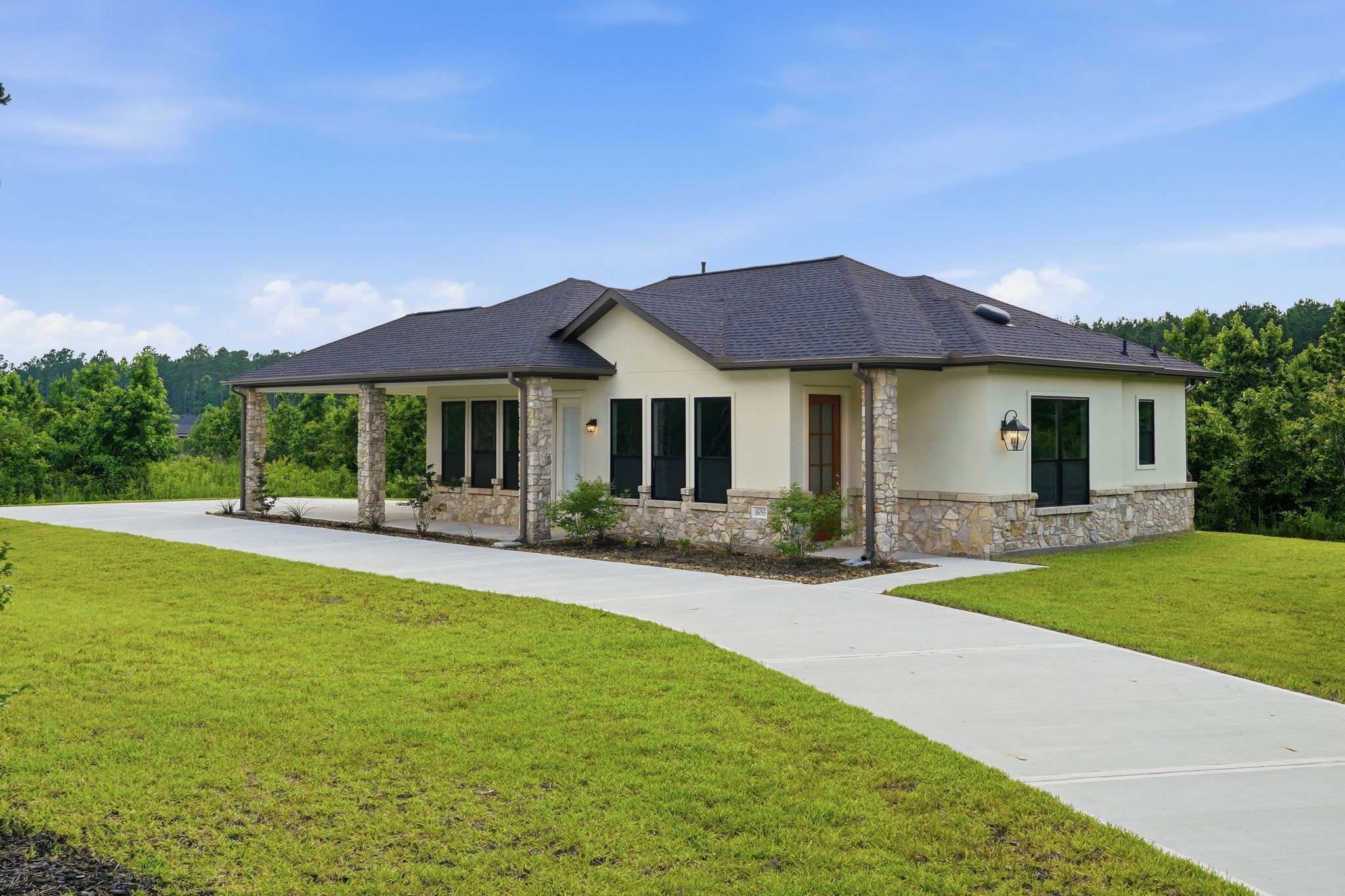 16081 Forest Mill Road Willis, TX 77378 - Photo 30 of 37 Rarely found and exceptionally versatile, the detached guest house offers private accommodations perfect for multigenerational living, extended family, visiting guests, executive relocation, or a dedicated home office—all while maintaining privacy from the main residence.