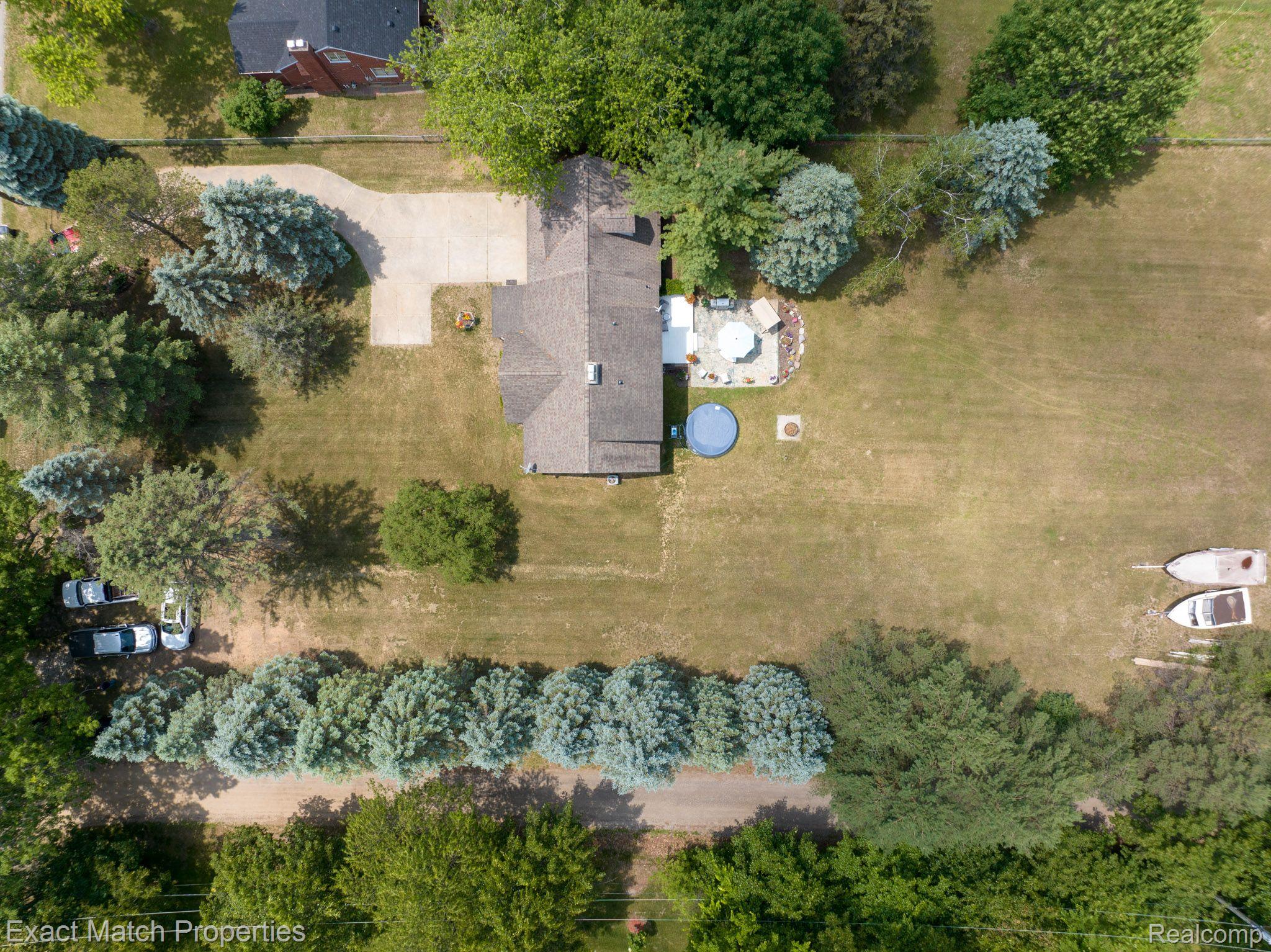 3916 Gregory Road Lake Orion, MI 48359 - Photo 36 of 36 Drone Photo shows the Mature Tree lined Property..