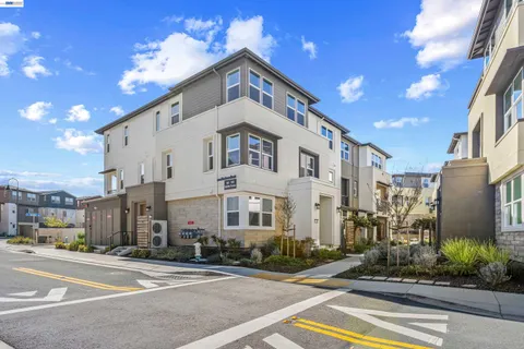 a view of a building with a street