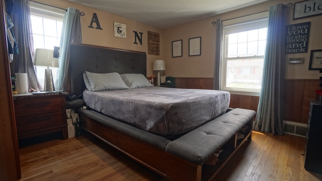 41 Parallel Street Springfield, MA 01104 - Photo 20 of 35 a bedroom with a bed and window