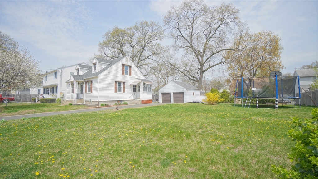 41 Parallel Street Springfield, MA 01104 - Photo 5 of 35 a front view of a house with a garden