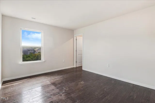 a bathroom with a sink mirror toilet and bathtub