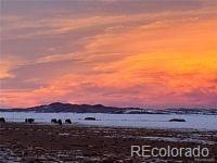 2667 Cahokia Road Hartsel, CO 80449 - Photo 23 of 38 a view of a lake with a mountain in the background