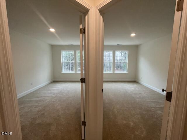 6431 Granite Quarry Drive Raleigh, NC 27610 - Photo 24 of 59 an empty room with windows and closet