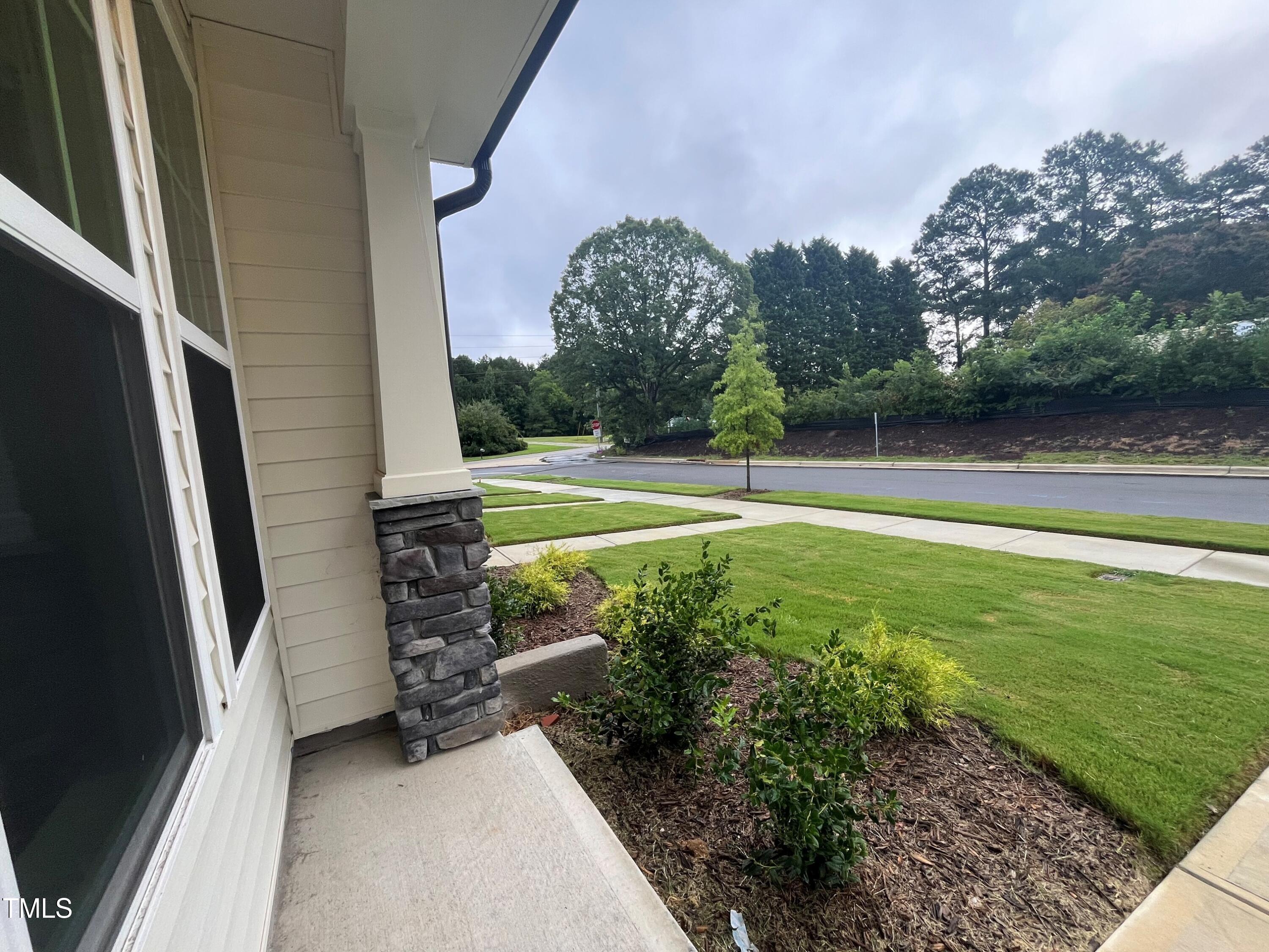 6431 Granite Quarry Drive Raleigh, NC 27610 - Photo 3 of 59 a view of a back yard of the house