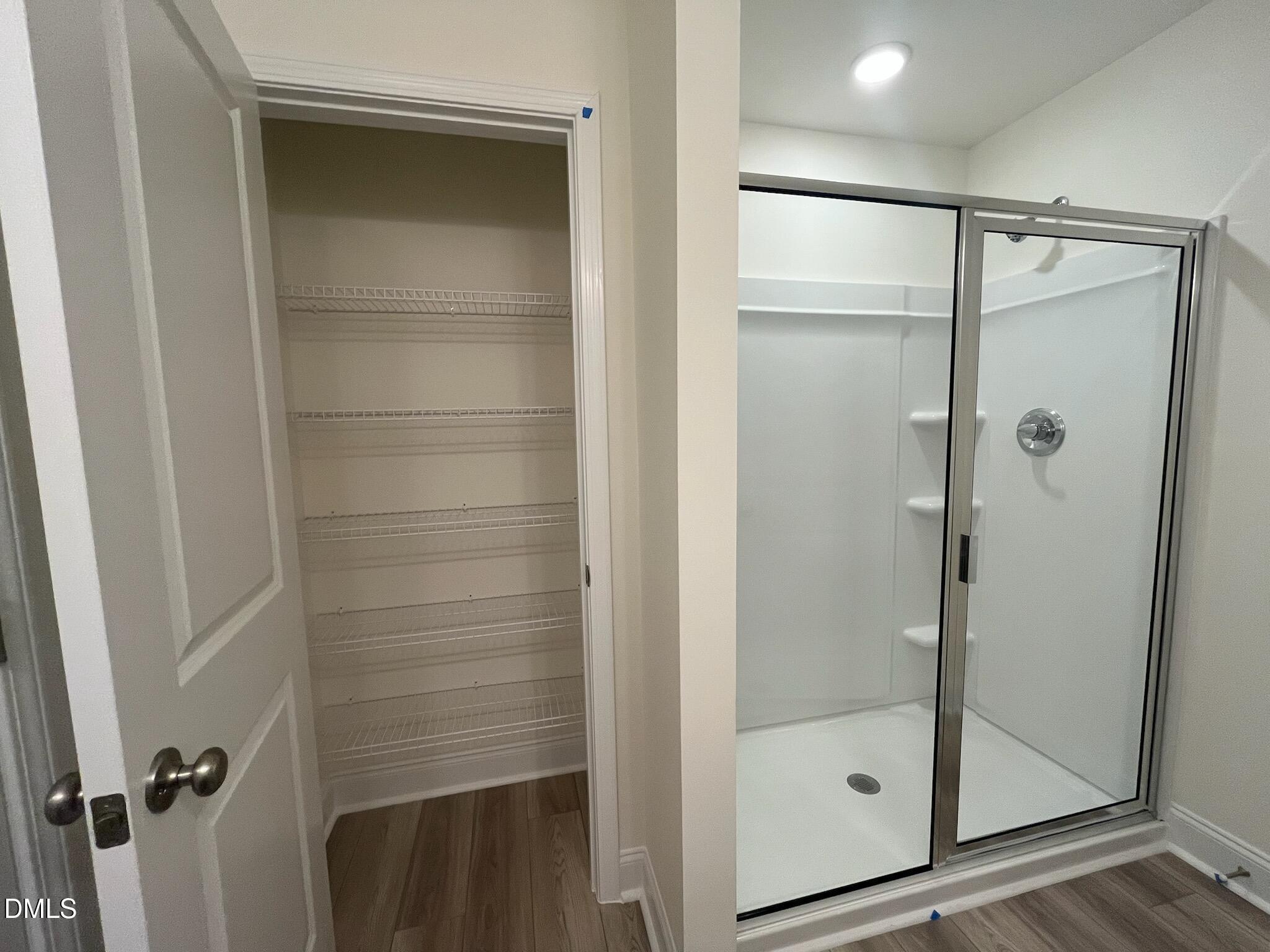 6431 Granite Quarry Drive Raleigh, NC 27610 - Photo 33 of 59 Primary shower with private linen closet