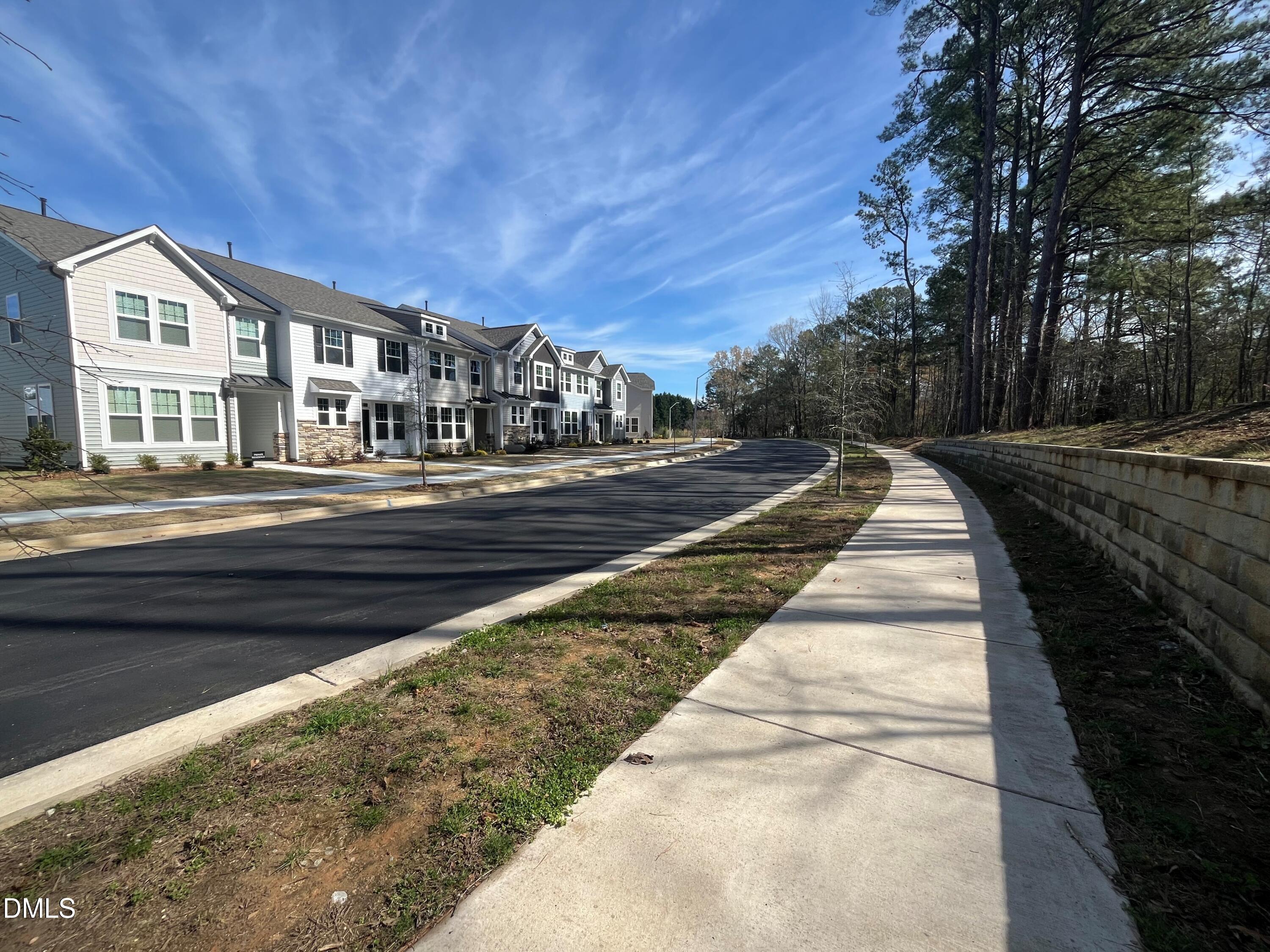 6431 Granite Quarry Drive Raleigh, NC 27610 - Photo 4 of 59 Sidewalks and Tree views