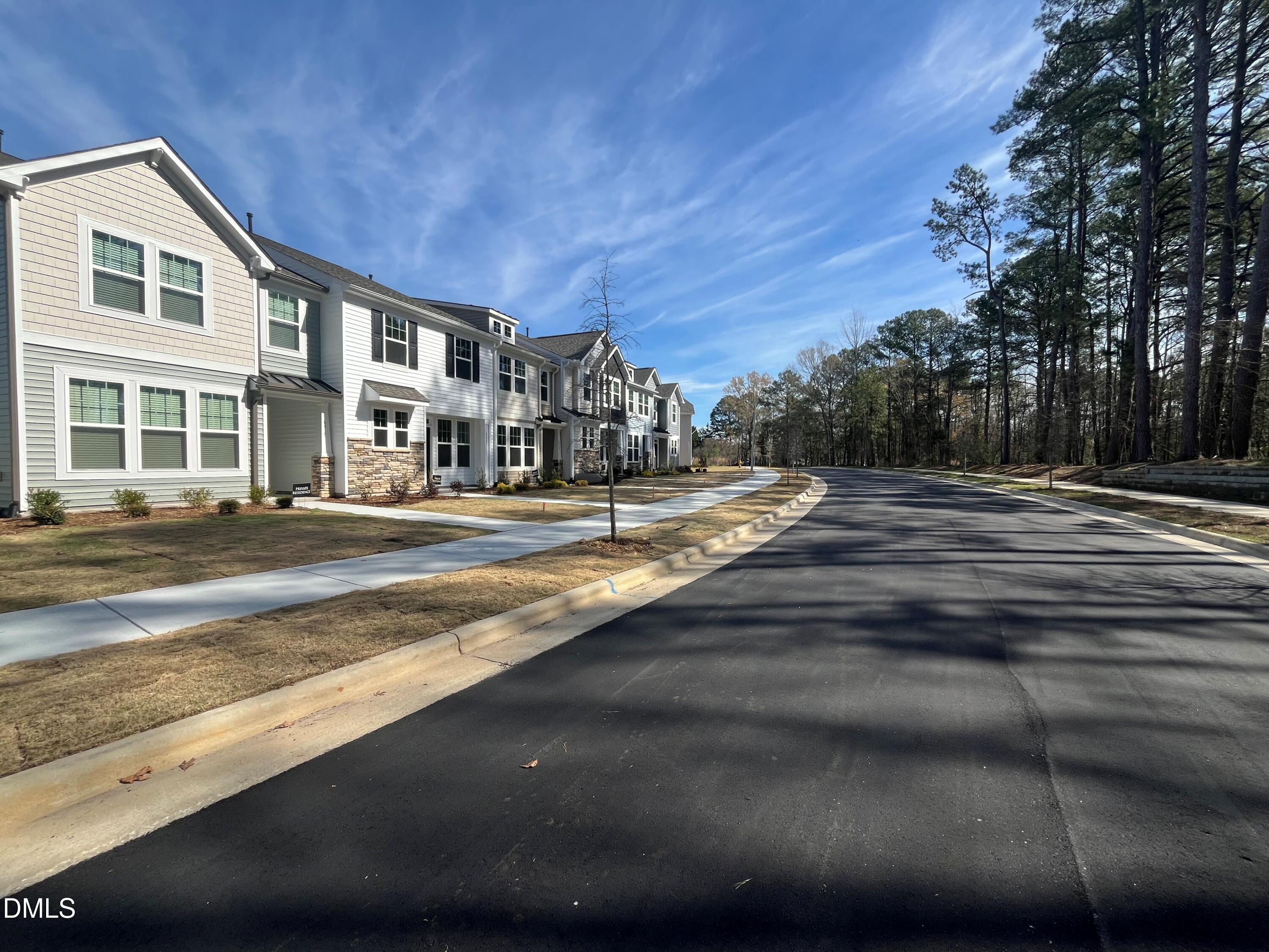 6431 Granite Quarry Drive Raleigh, NC 27610 - Photo 5 of 59 Sidewalks and tree views