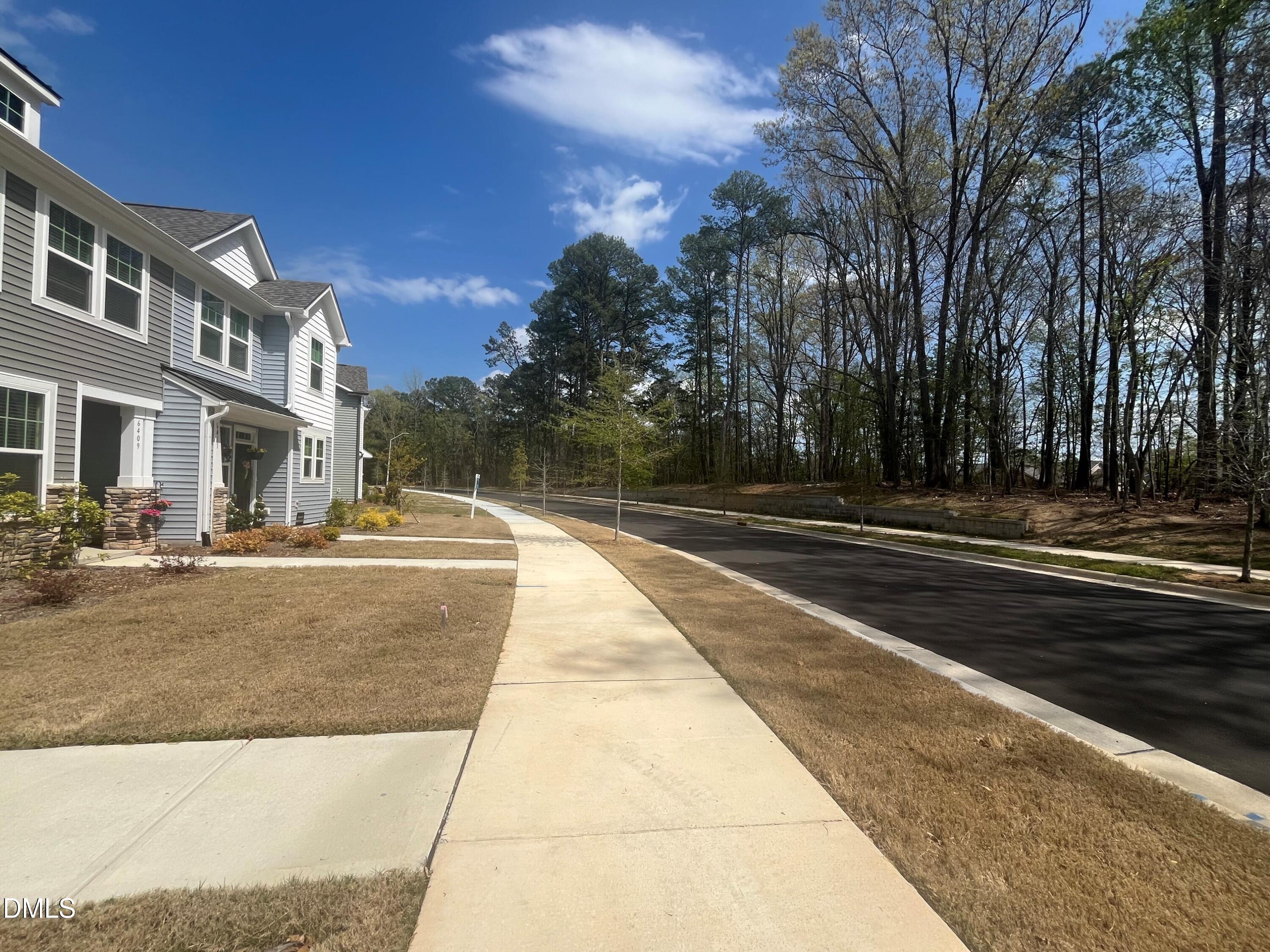 6431 Granite Quarry Drive Raleigh, NC 27610 - Photo 6 of 59 a view of swimming pool with outdoor seating
