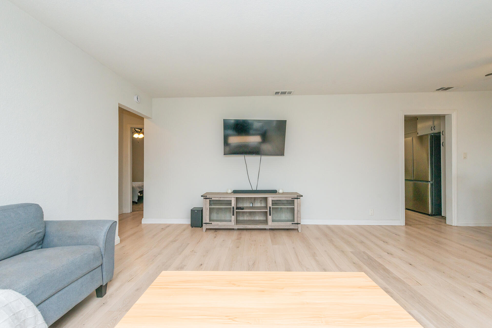 1115 2nd Street Redding, CA 96002 - Photo 12 of 39 a living room with furniture and a flat screen tv