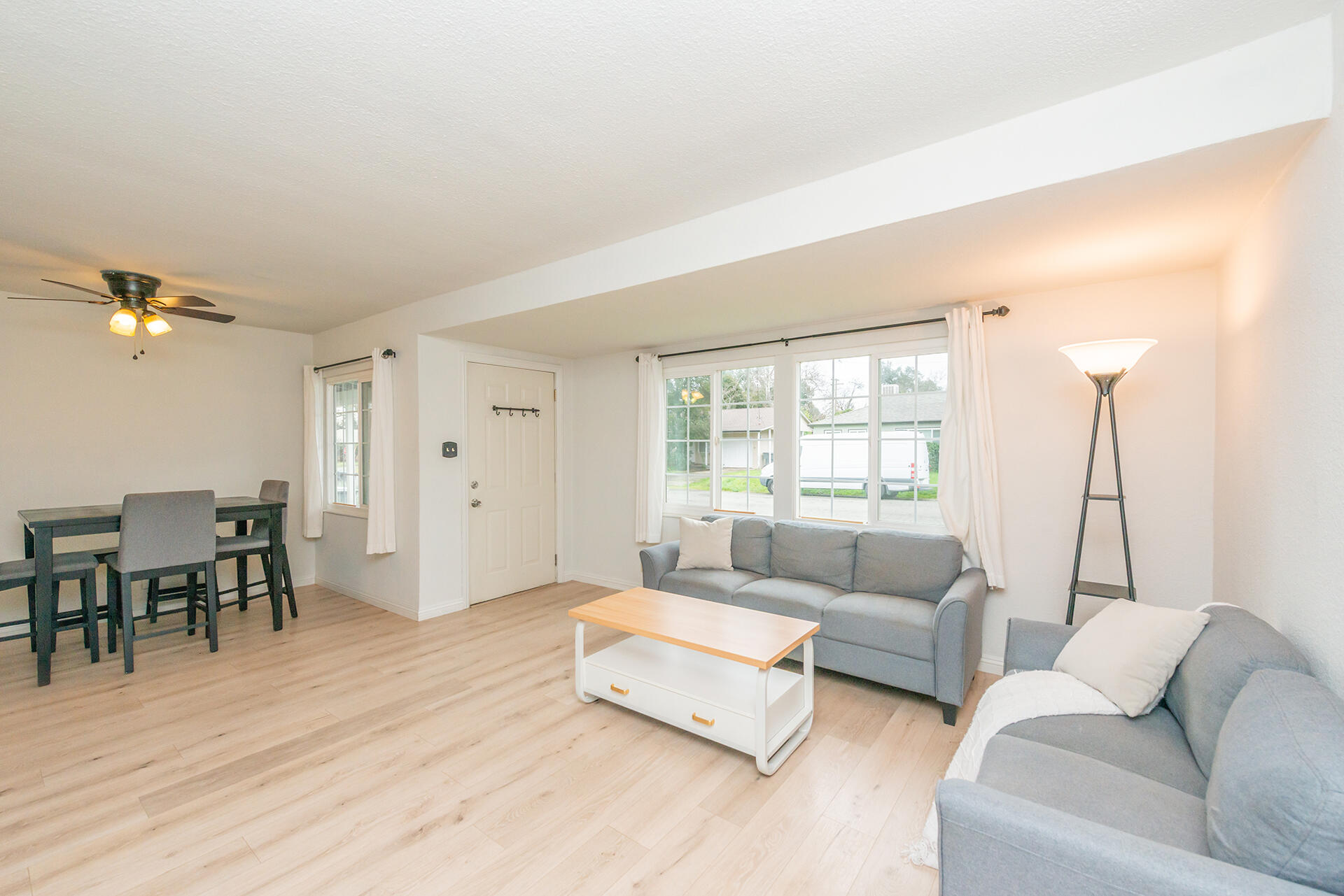 1115 2nd Street Redding, CA 96002 - Photo 13 of 39 a living room with furniture and a large window
