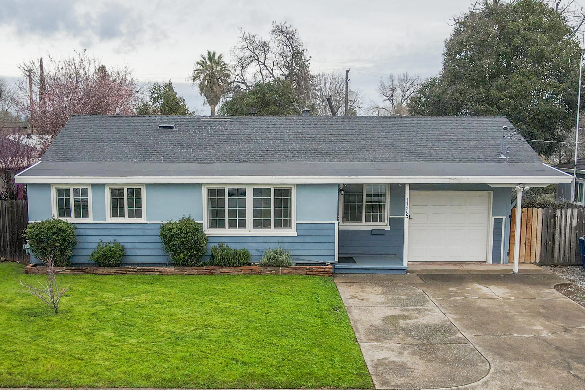 1115 2nd Street Redding, CA 96002 - Photo 3 of 39 a front view of house with yard and green space