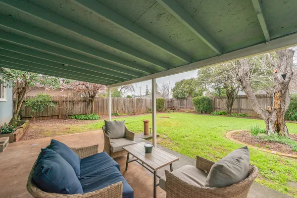 a outdoor living space with furniture and garden