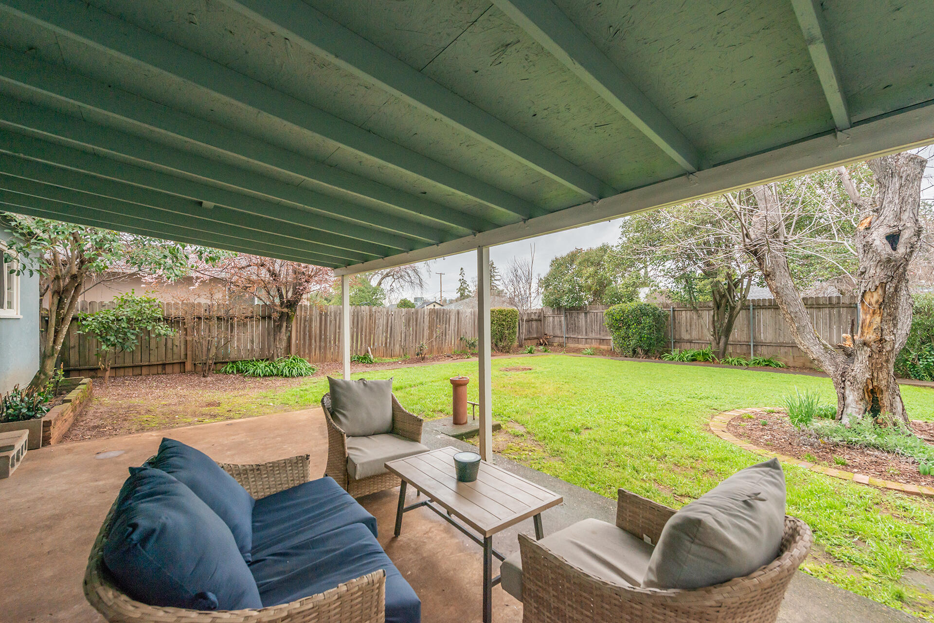 1115 2nd Street Redding, CA 96002 - Photo 34 of 39 a outdoor living space with furniture and garden