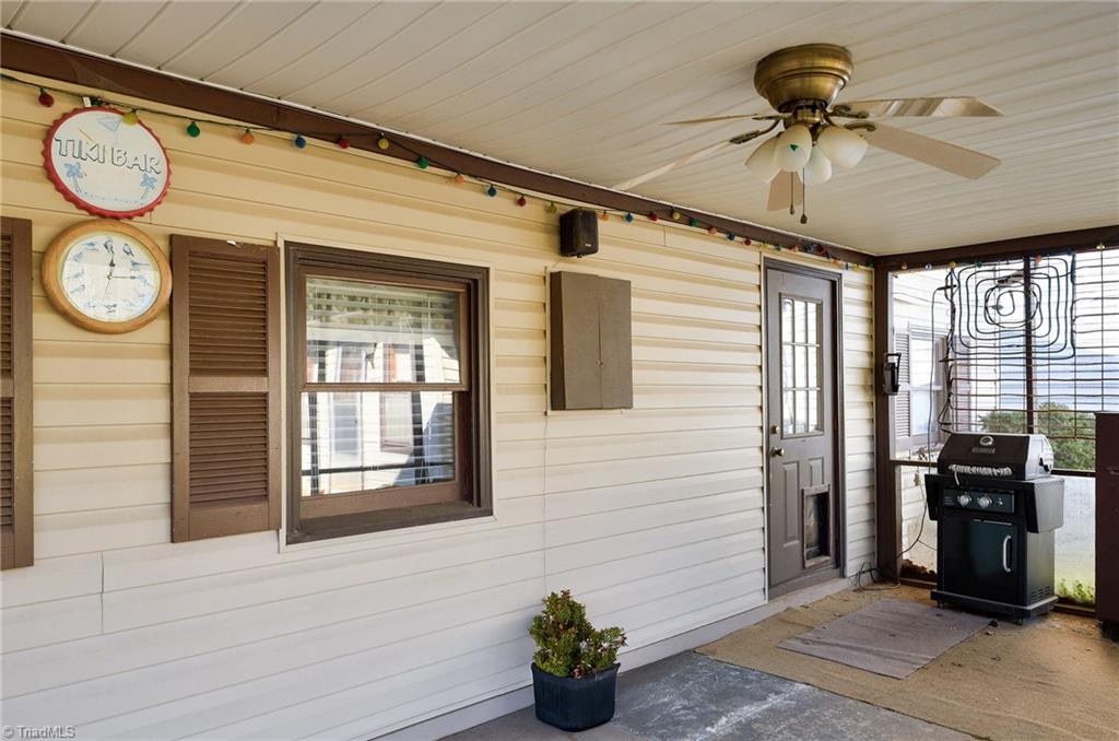 1920 Riverview Road Lexington, NC 27292 - Photo 23 of 30 Screened in porch on the front of the house