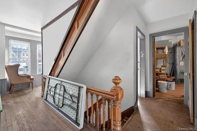 a view of an entryway and livingroom with furniture