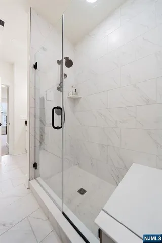 a bed room with a bed and furniture