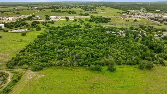 a view of city with ocean