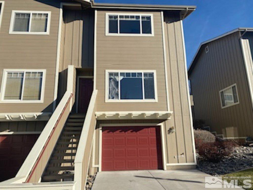 4150 Amber Marie Lane Reno, NV 89503 - Photo 1 of 16 a front view of a house with many windows