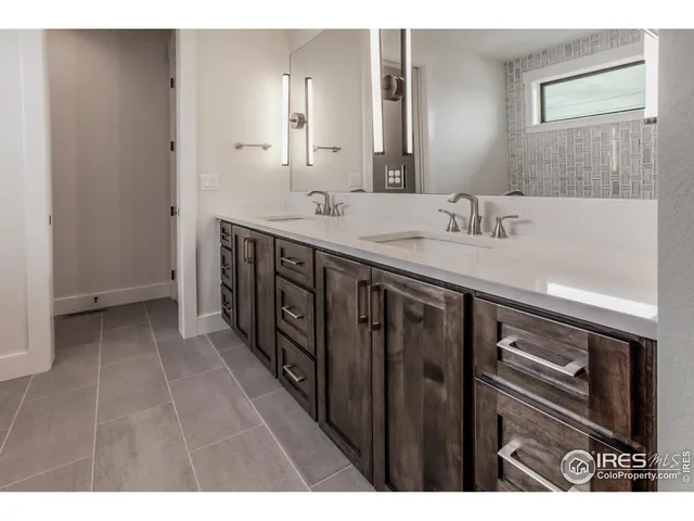 a white bath tub sitting in a bathroom