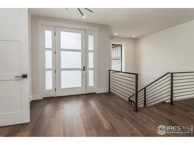 a view of a livingroom with wooden floor