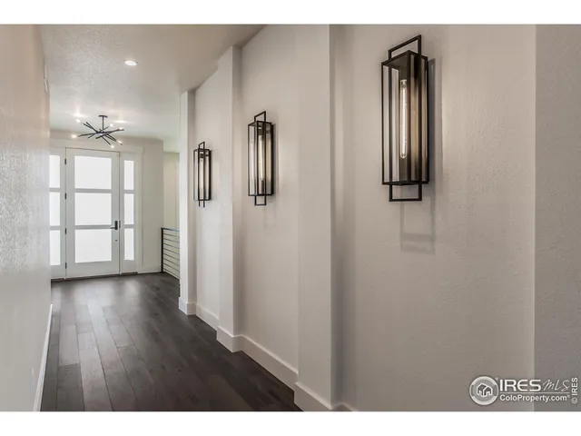a view of entryway with wooden floor