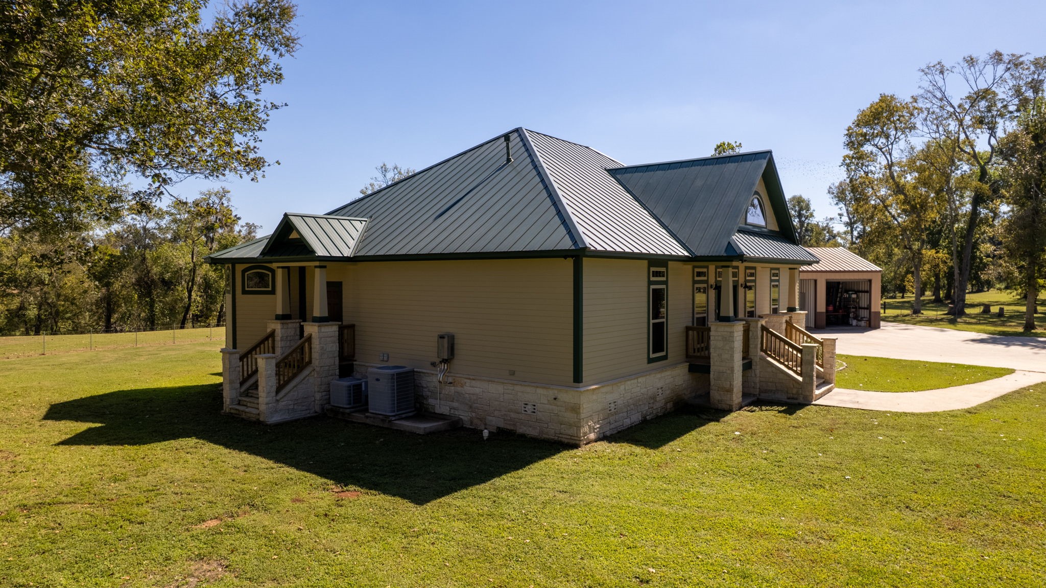 3998 County Road 612 Angleton, TX 77515 - Photo 4 of 47 a house view with a garden space