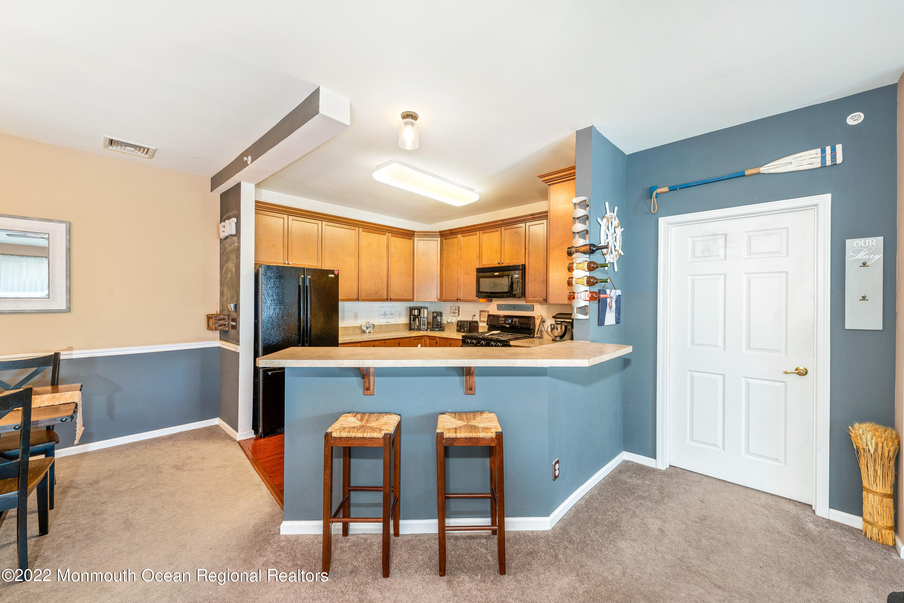 136 Mill Pond Way, Unit 22 Eatontown, NJ 07724 - Photo 13 of 29 a kitchen with stainless steel appliances granite countertop a refrigerator and microwave