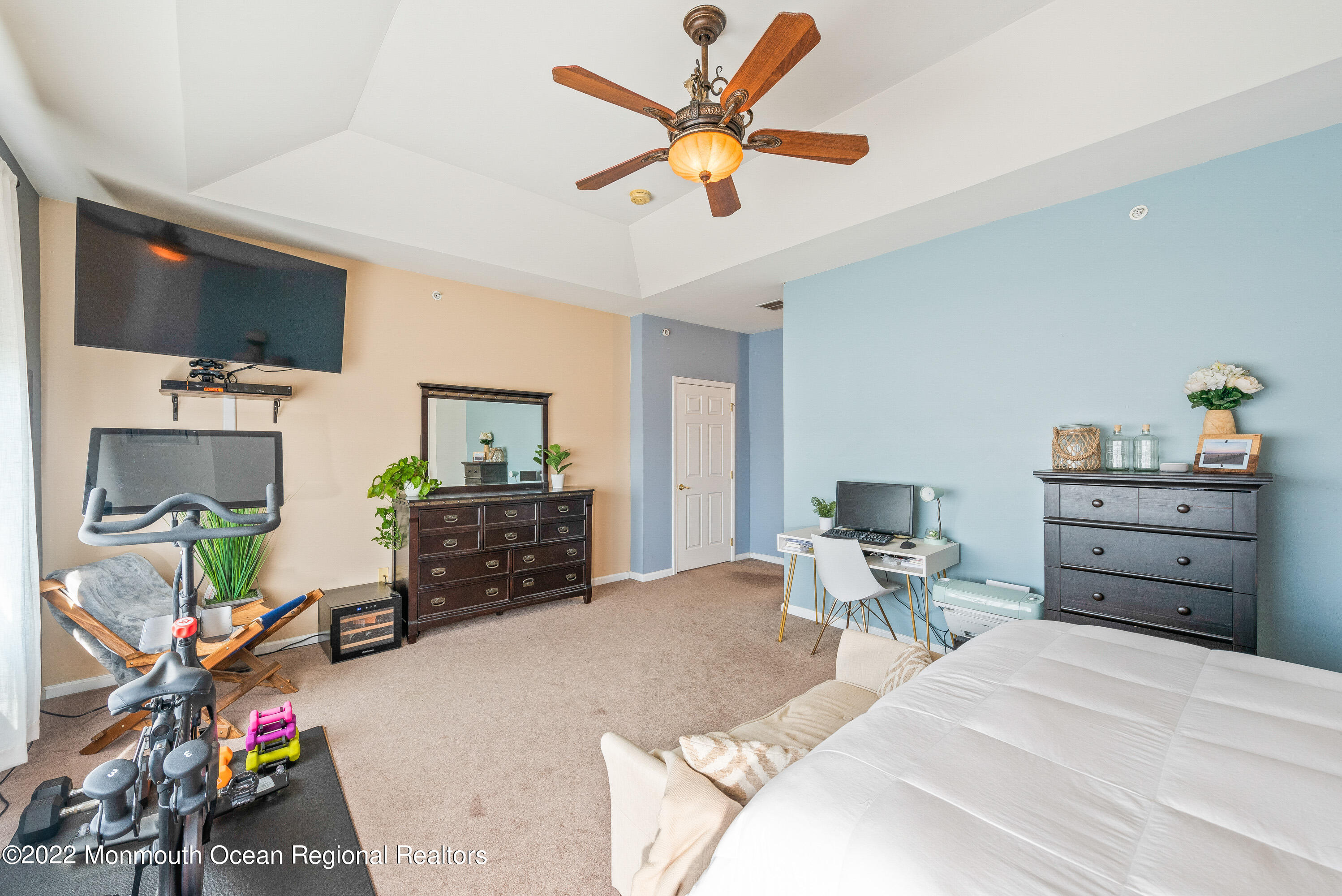 136 Mill Pond Way, Unit 22 Eatontown, NJ 07724 - Photo 20 of 29 a bedroom with a bed and furniture