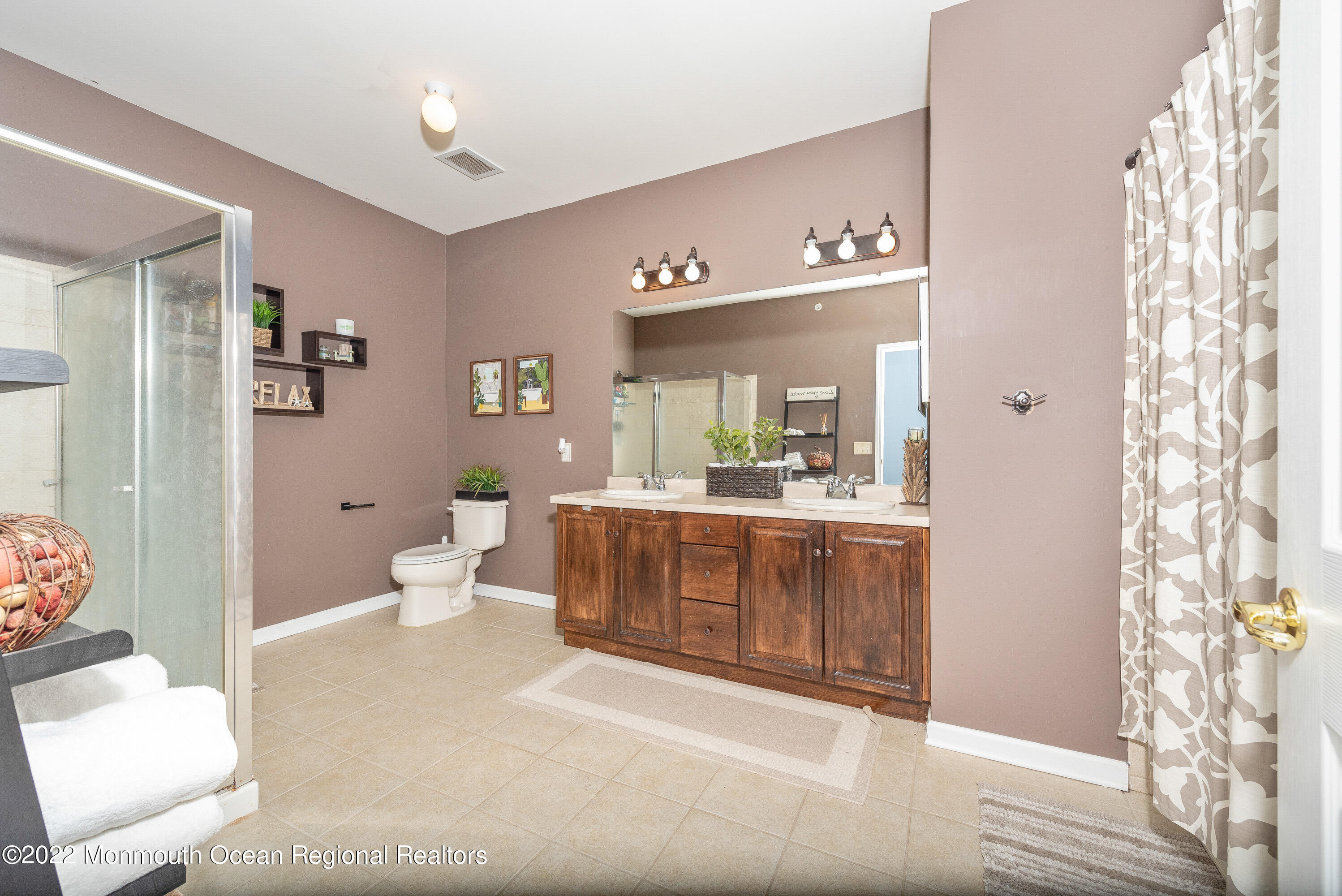 136 Mill Pond Way, Unit 22 Eatontown, NJ 07724 - Photo 21 of 29 a spacious bathroom with a bathtub shower sink and toilet
