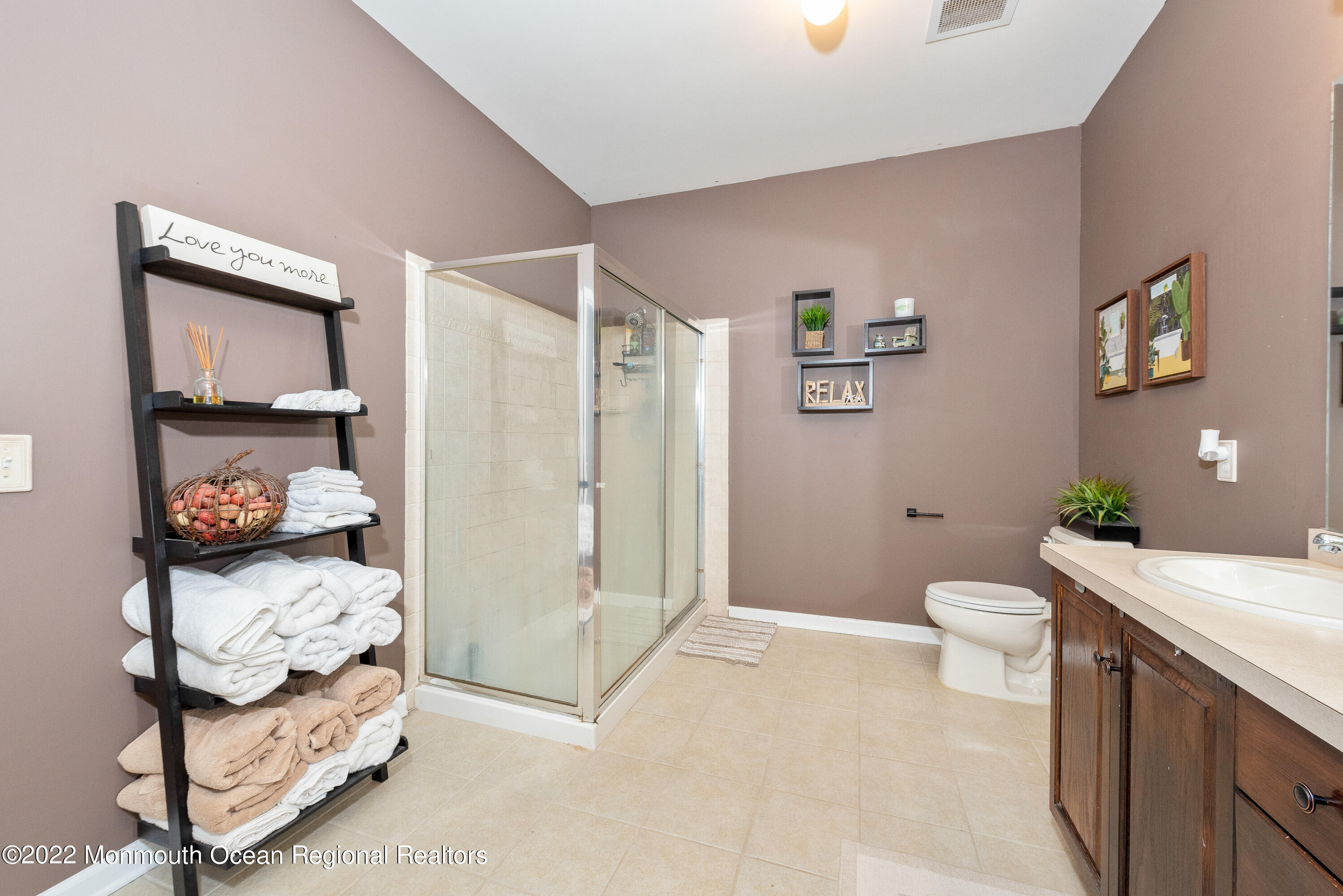 136 Mill Pond Way, Unit 22 Eatontown, NJ 07724 - Photo 22 of 29 a bathroom with a sink toilet and shower