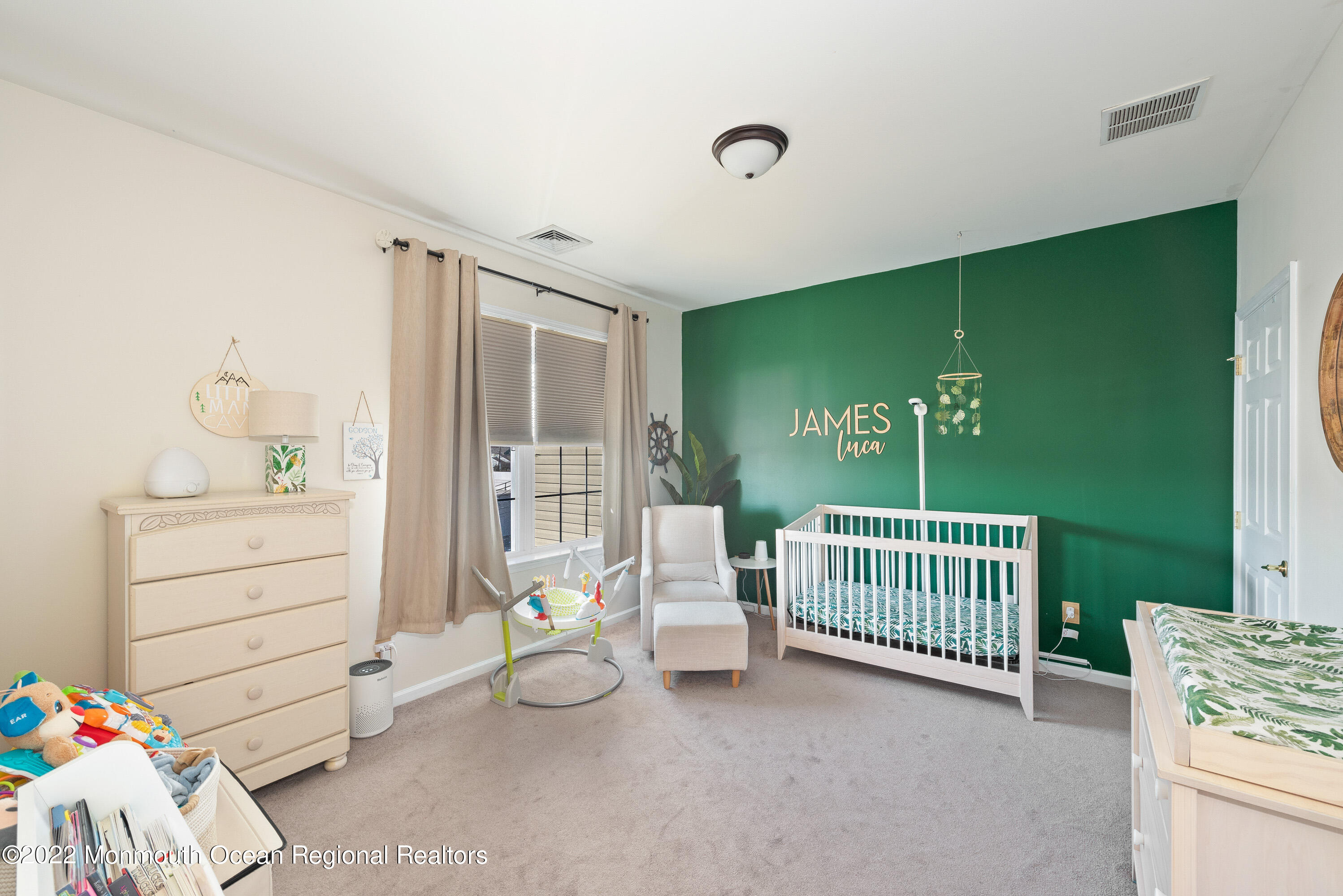 136 Mill Pond Way, Unit 22 Eatontown, NJ 07724 - Photo 24 of 29 a bedroom with furniture and a window