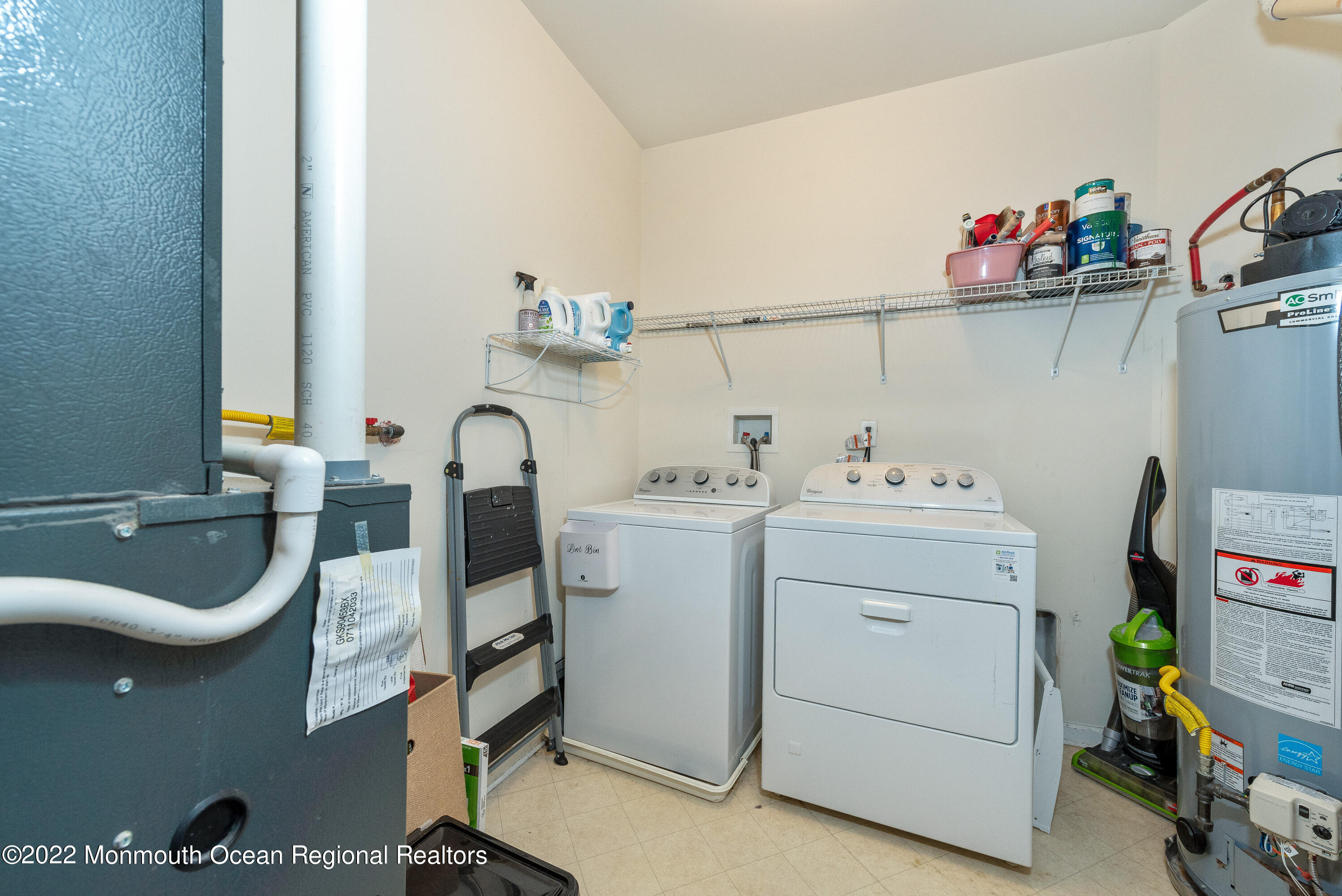 136 Mill Pond Way, Unit 22 Eatontown, NJ 07724 - Photo 25 of 29 a utility room with dryer and washer