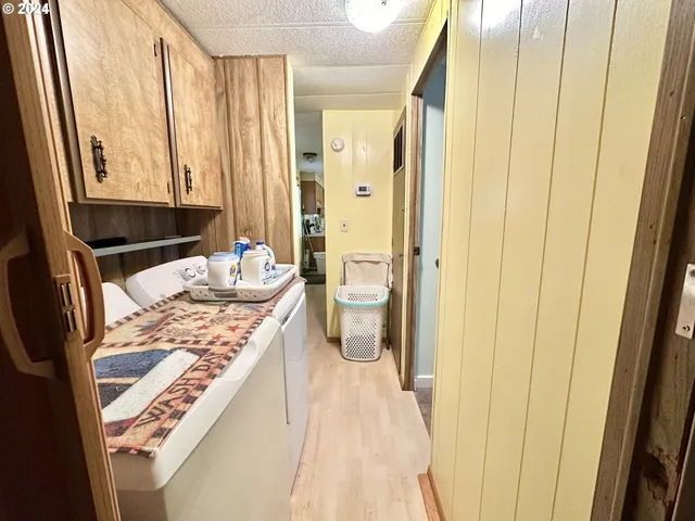 a living room with a stove and a table