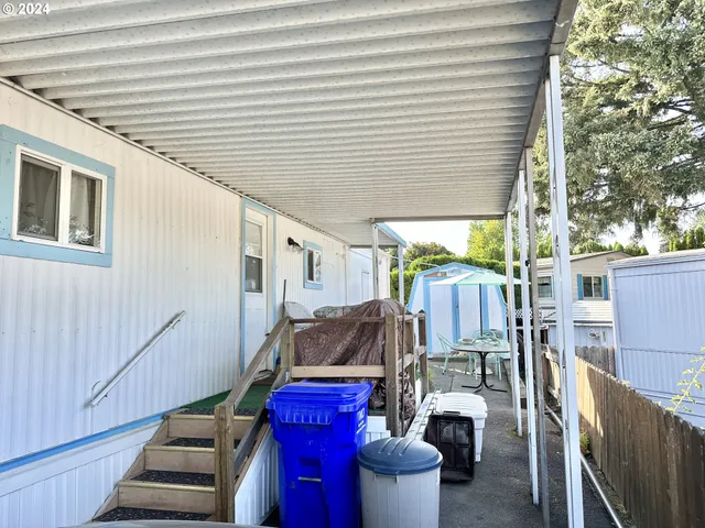a garage with table and chairs