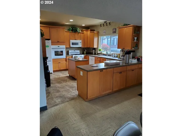 a room with a sink and a workspace