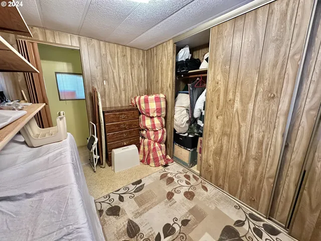 a view of a balcony with furniture and rug