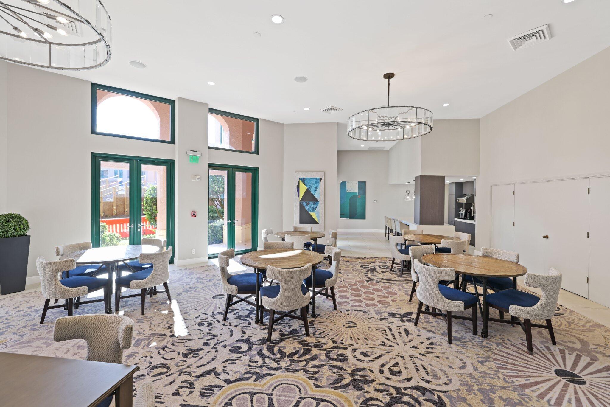 100 Southeast 5th Avenue, Unit 106 Boca Raton, FL 33432 - Photo 66 of 81 a view of a dining room with furniture window and wooden floor